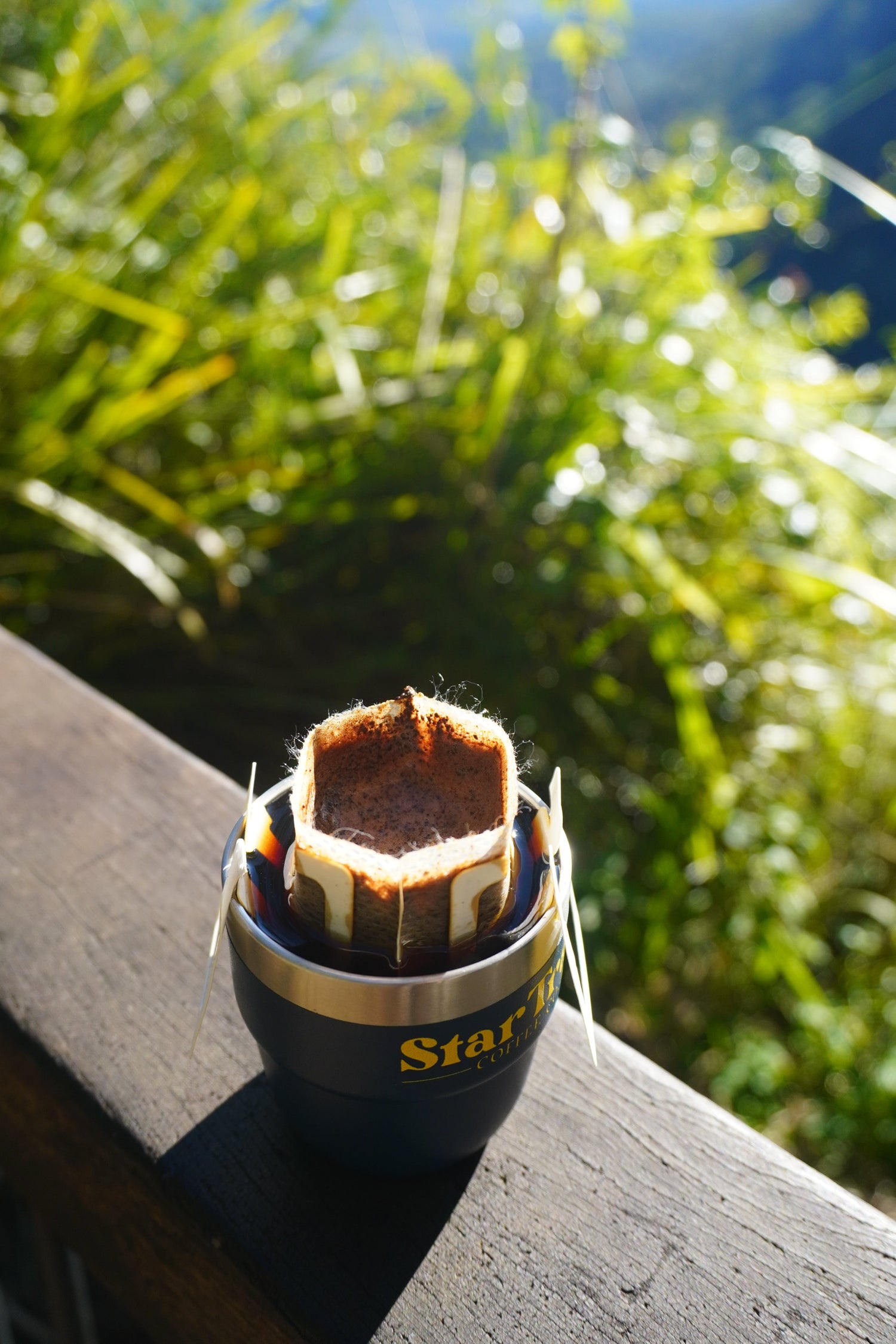Startrail coffee drip bag in adventure cup brewed