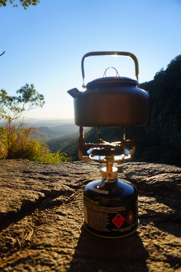 startrail camping kettle with mountain view