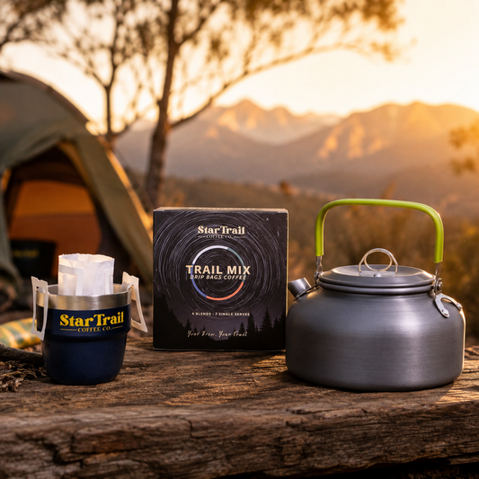 StarTrail Camping Coffee Kit with kettle, Adventure Cup and Trail Mix coffee at an outdoor campsite